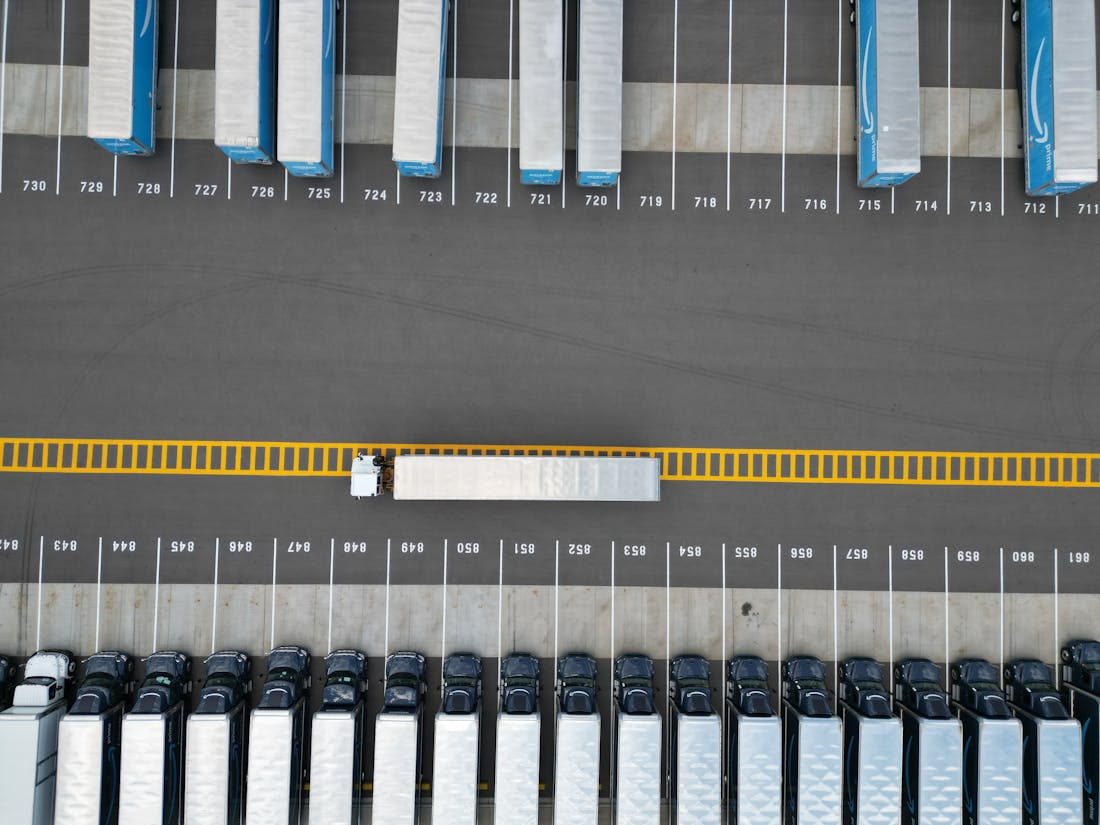 Aerial view of truck trailers in a logistics yard